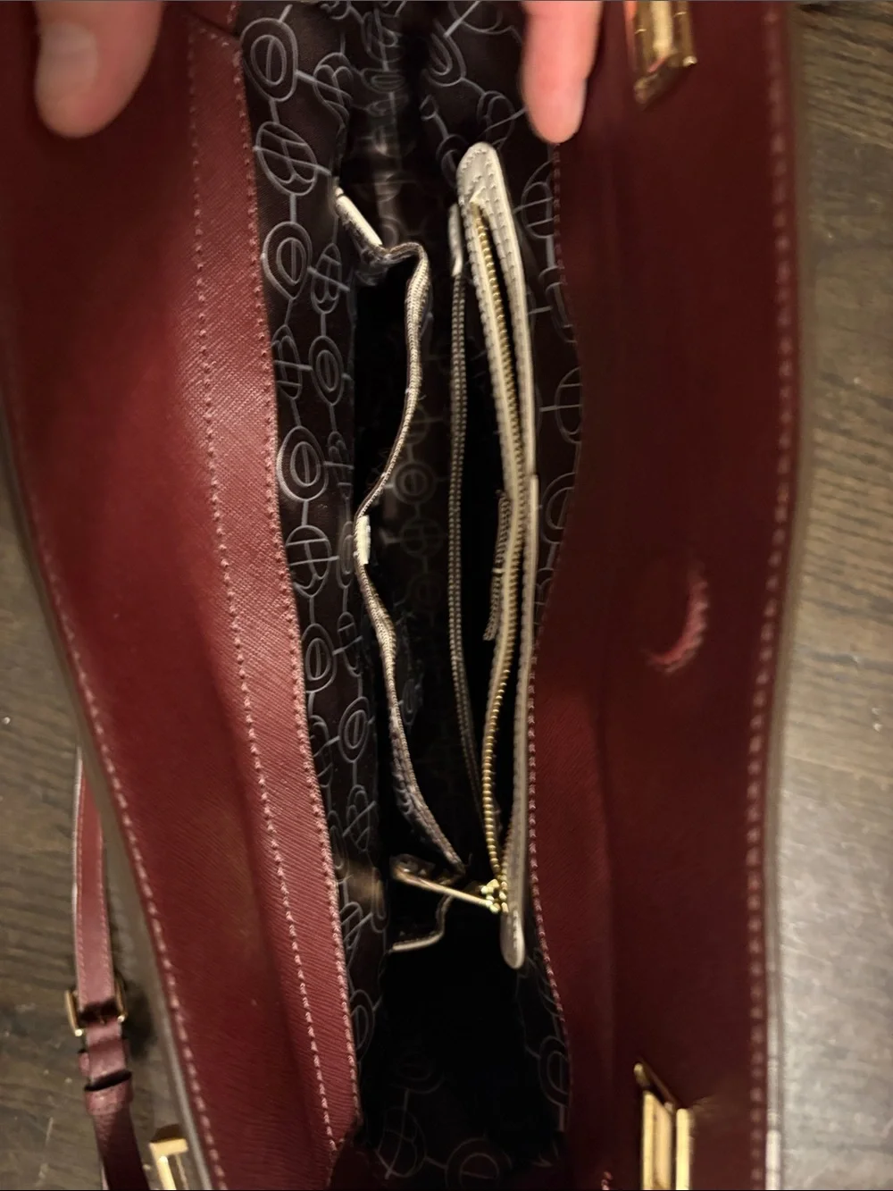 henri bendel wine red saffiano leather satchel with gold-tone charm